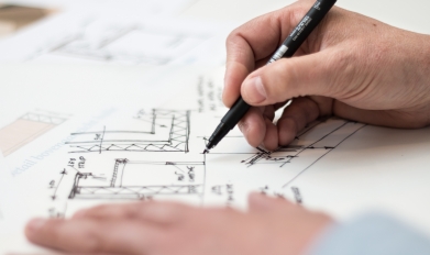 man creating an architecture design